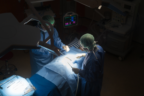 Asian Doctor And An Assistant In The Operating Room For Surgical Venous Vascular Surgery Clinic In Hospital